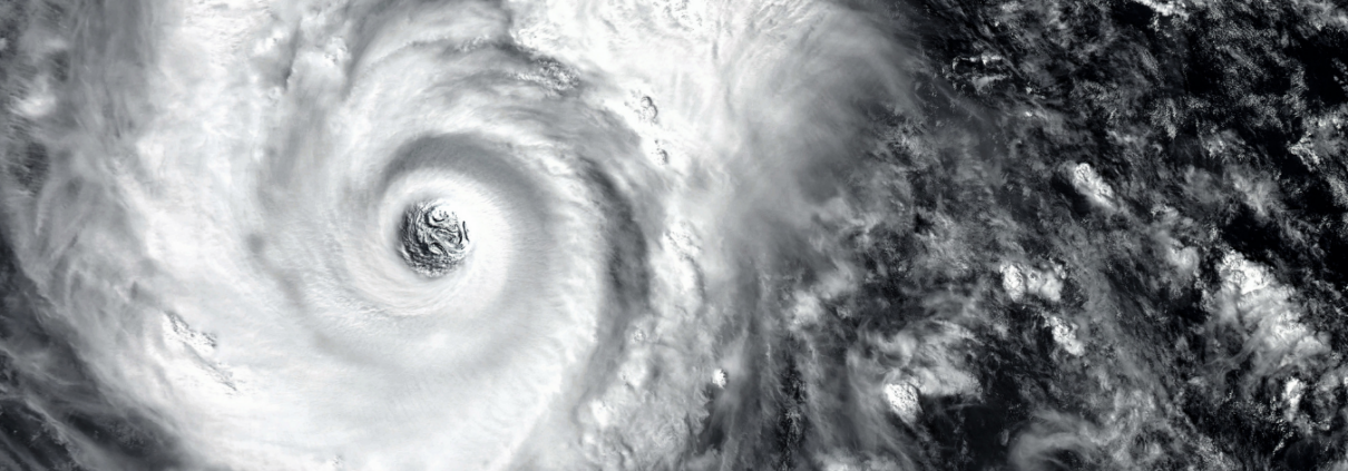 Is Your Roof Ready for Hurricane Season Eye of a hurricane viewed from above the clouds
